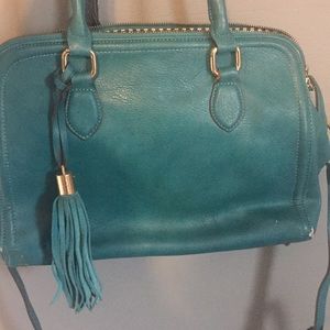 Turquoise purse with tassel